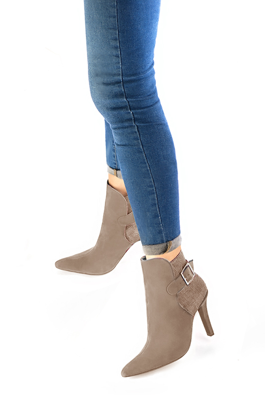 Tan beige women's ankle boots with buckles at the back. Tapered toe. Very high slim heel. Worn view - Florence KOOIJMAN